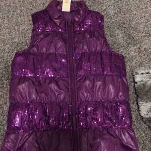 a purple vest